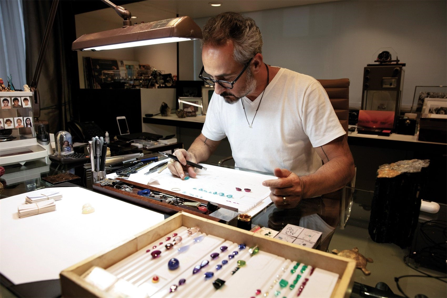 David, gemstone lapidary artisan, working at a bench